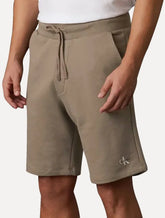 Bermuda Calvin Klein Jeans Moletom Masculina Cadarço RE Issue Cáqui Médio