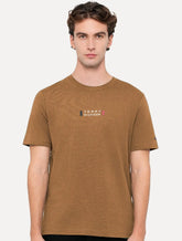 Camiseta Tommy Hilfiger Masculina Stack Center Brand Love Print Marrom Médio