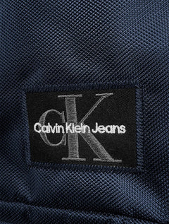 Mochila Calvin Klein Jeans Masculina Patch RE Issue Azul Marinho