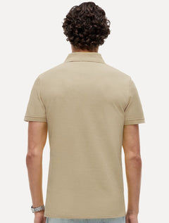 Polo Tommy Hilfiger Masculina Slim Piquet 1985 Cáqui Claro