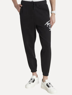 Calça Tommy Jeans Moletom Masculina Spray Logo Preta